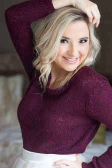 A beauty photo shoot in a studio in Portland, OR. This is a standing pose.